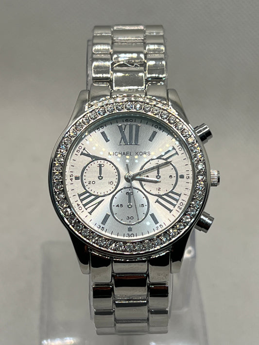 Radiant Michael Kors Silver Tone Women's Watch with Pave Diamond Dial